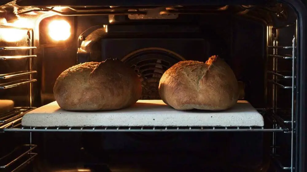 backing bread on pizza stone